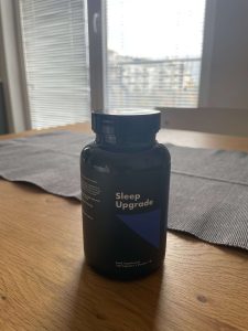 NooCube Sleep Upgrade supplement bottle with packaging, natural sleep support formula for relaxation and better rest